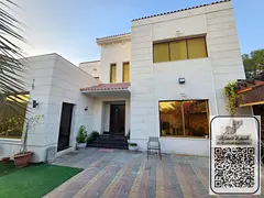 Corner villa with a large area, 6 master bedrooms, 2 living rooms, a majlis (formal sitting room), a