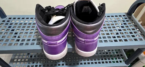 Used high-top purple and black sneakers, size approx. adult