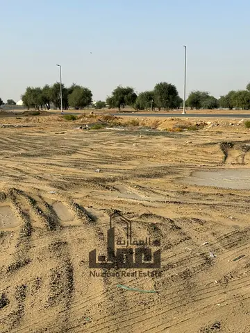 Residential land for sale in Al Hoshi Sharjah corner plot in modern villa community prime investment opportunity