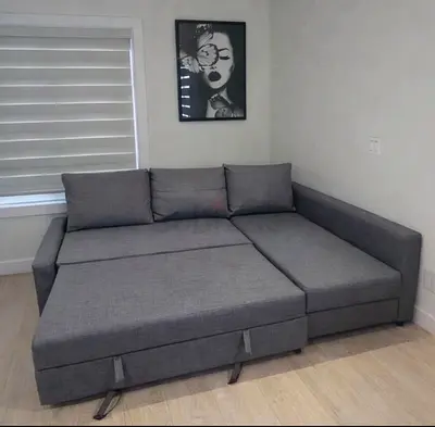 Grey L-shaped Sofa Bed / Sectional with Storage - Good Condition