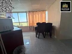 Fully furnished apartment for sale in Orient Towers, Ajman. 1,600 sq.ft, 2BR hall, maid’s room, po