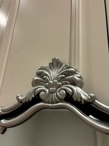 Ornate Silver-Carved Mirror
