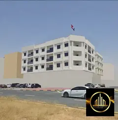Corner residential/commercial building on the main street for sale in Al-Aliya, Ajman