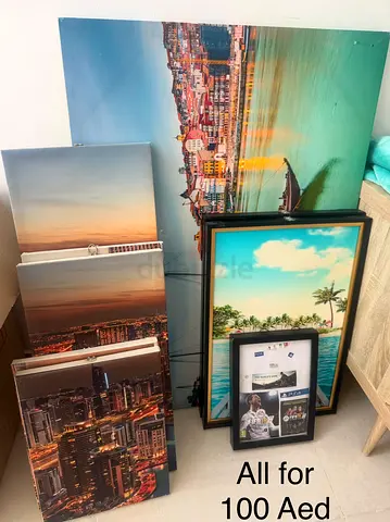 Set of assorted framed cityscape and landscape prints - all for 100 AED