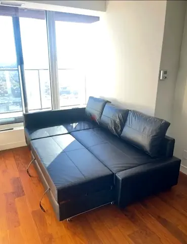 Black leather convertible sofa bed  Lshape