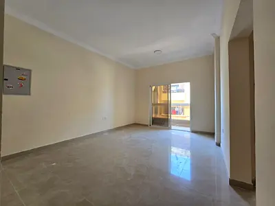 For monthly rent, unfurnished, in Al Hamidiya 1, Ajman: a one-bedroom apartment in a prime location opposite Al Hamidiya Police Station and next to Ke