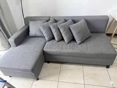 IKEA Right-arm Grey L-shaped Sofa cum bed with 4 Cushions (Good condition)