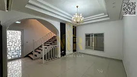 In Al Yasmin, a 3260 sq ft two-story villa with five master bedrooms, a majlis, two living rooms, a