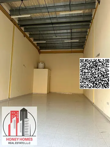 1000 SQFT Road-Facing Full-Height Shop for Rent – Al Jurf Industrial Area 2