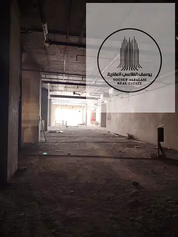 Shop for rent in Al Amerah, prime location, area 3,170 sq ft, price AED 285.3 per year