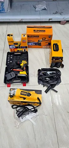 Used combo of power tools: drill, angle grinder and welding machine