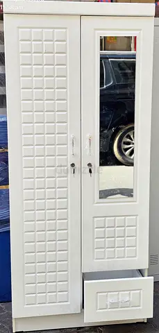 Were selling brand new two door cabinet