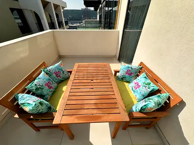 Wooden Outdoor Dining Set with Benches and Cushions - Good Condition