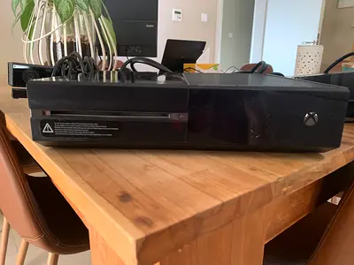 Used Xbox One console with cables (good working condition)