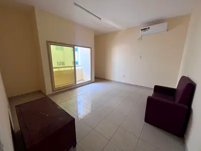 One bedroom and living room - annual rent - Ajman Corniche - central air conditioning - maintenance included by the owner.