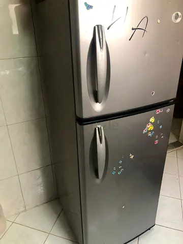 Silver Top-Freezer Refrigerator - Good Working Condition