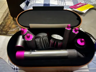 Dyson airwrap with 4 tall cylinders.