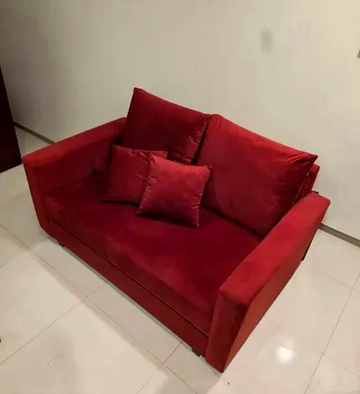 Available for sale  1 burgundy sofa 2 seaters