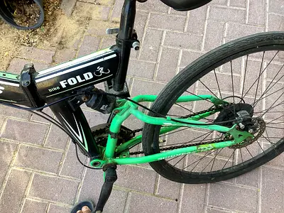 Used Green Folding  Bike — Needs Minor Repair
