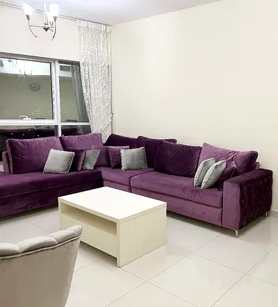 Plush Purple L-Shaped Velvet Sofa - Good Condition