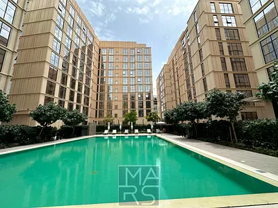 A one-bedroom apartment is available for rent in a prestigious compound, offering comfort and privacy, for AED 47,000 per year.