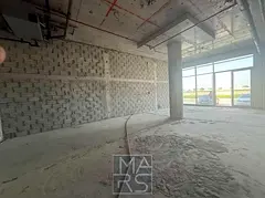 Premium commercial shops available for rent in "Ajmal Makan" compound, located in a vibran