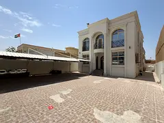 5-bedroom standalone villa with a spacious majlis and a large, comfortable living room, suitable for