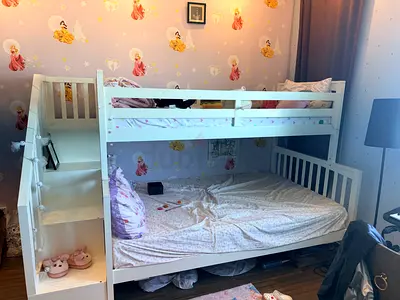 White wooden kids bed with storage shelf and mattress
