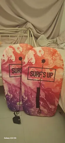 Pair of colorful bodyboards (Surfs Up) - good condition