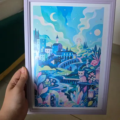 framed illustrative art print featuring a fantasy cityscape with a cat.