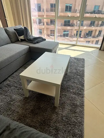 Small white coffee table — simple modern design