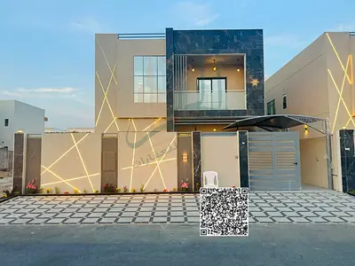 Luxury villa for rent in Al Zahya, ready to move in, featuring 5 master bedrooms, majlis, living hall, private yard with garden, rooftop, fully equipp