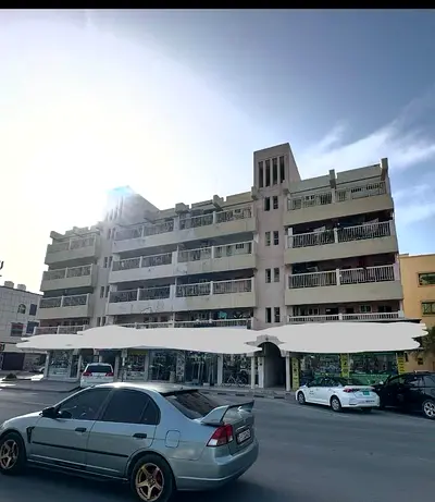 مبنى تجاري وسكني مكون من 6 طوابق (أرضي + 6) للبيع في عجمان الرميلة