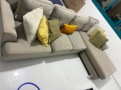 Light grey L-shaped corner sofa with chaise - good condition
