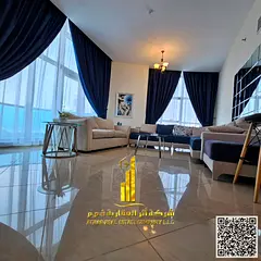 Luxury two-bedroom apartment with a direct sea view, fully furnished - for rent in Ajman - Corniche