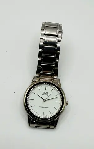QQ Analog Quartz Stainless Steel Bracelet Womens Watch.
