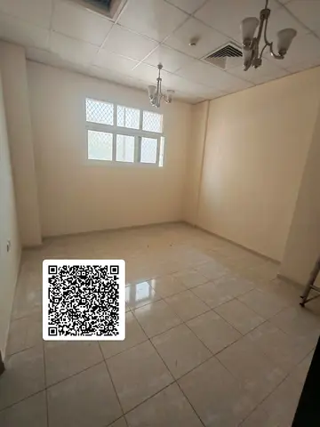 In the heart of the Al Butaina area in Sharjah, a distinctive apartment is now available for annual rent, with excellent specifications suitable for f