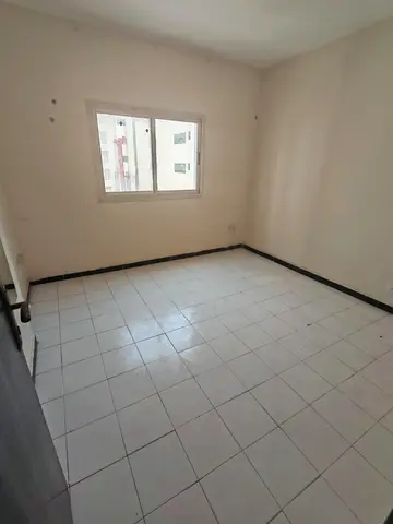 Spacious Two Bedroom Apartment in Al Qasimia at Great Price