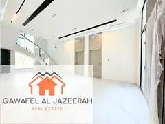 Brand naw villa for rent in al khawaneej { 4bedroom + hall + majlas + parking + maid room }