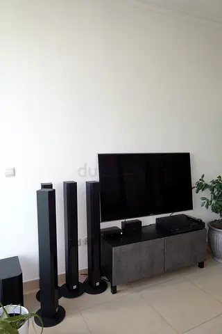 Samsung TV + Pioneer Home Theater System + Sony Blu-ray Player + Grey TV Stand
