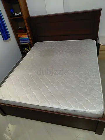 Queen wooden bed frame with mattress - solid dark wood, good condition