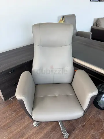 Light grey leather swivel office chair - good condition