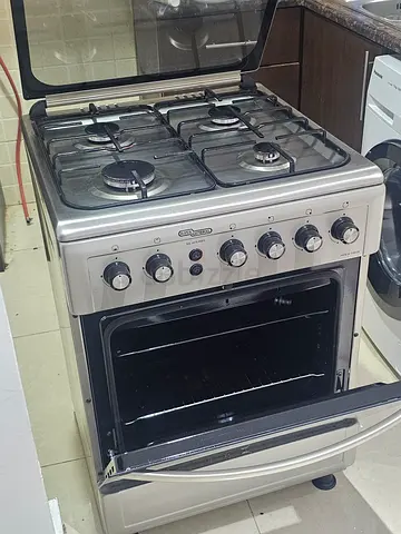 Large freestanding gas cooker with oven - stainless steel