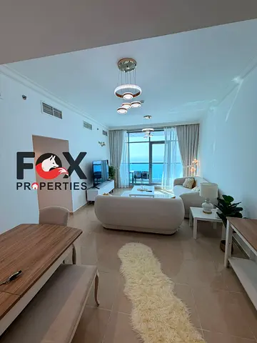 The most luxurious 3-bedroom apartment with a living room for annual rent in Corniche Towers Residence,fully furnished,including bills,with a sea view
