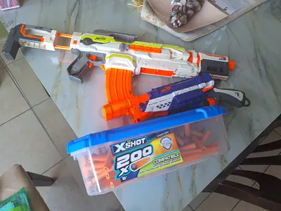 Nerf-style toy blaster set with extra darts (X-Shot compatible)