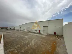 Spacious Industrial Warehouse with Prime Main Road Access | Al Sajaa