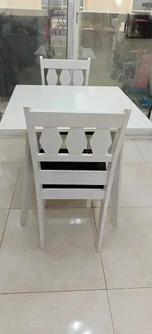 ​Compact White Dining Table with Chair– Space-Saving  Lightweight – AED 150 Negotiable