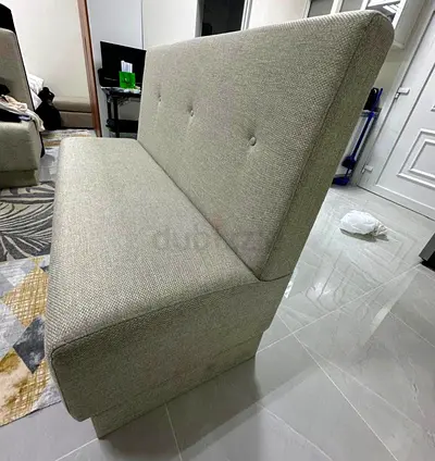 Light grey upholstered thee-seater bench/sofa (good condition)