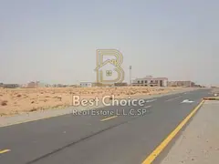 Two Adjacent Plots in Al Zubair – On a Main Road