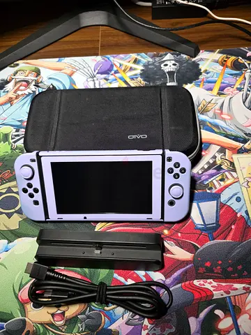 Nintendo Switch console with dock, case and cables - lilac Joy‑Con skins